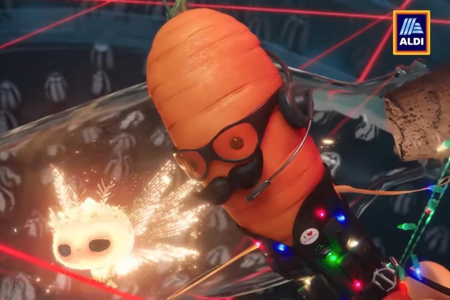Aldi mascot Kevin the Carrot in Aldi's Christmas 2024 ad.