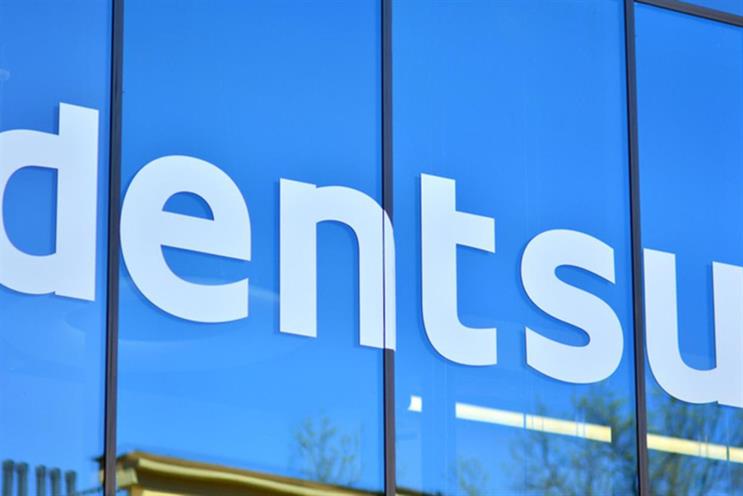 Dentsu: lowered its full-year outlook 