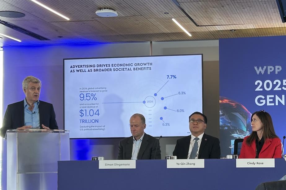 Mark Read presents at AGM in May, watched by Cindy Rose (far right)