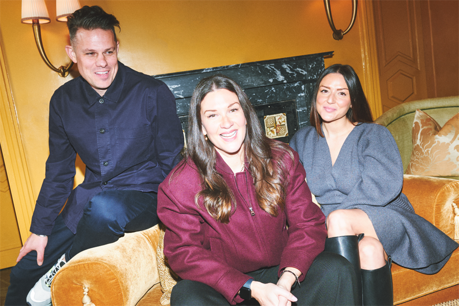 Picture of three people sitting on a sofa